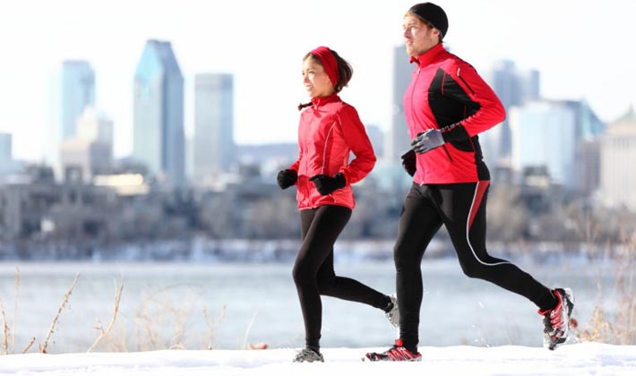 Citizens do exercise by jogging or with fitness equipment at a